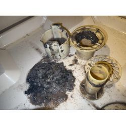 柏市 ドラム式洗濯機 排水口詰まり除去！の画像1